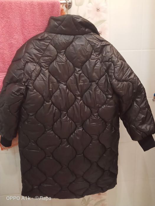 Продам пуховик новый,48-50
