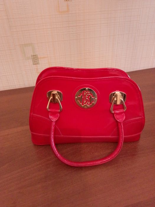 Новая лакированная сумка.