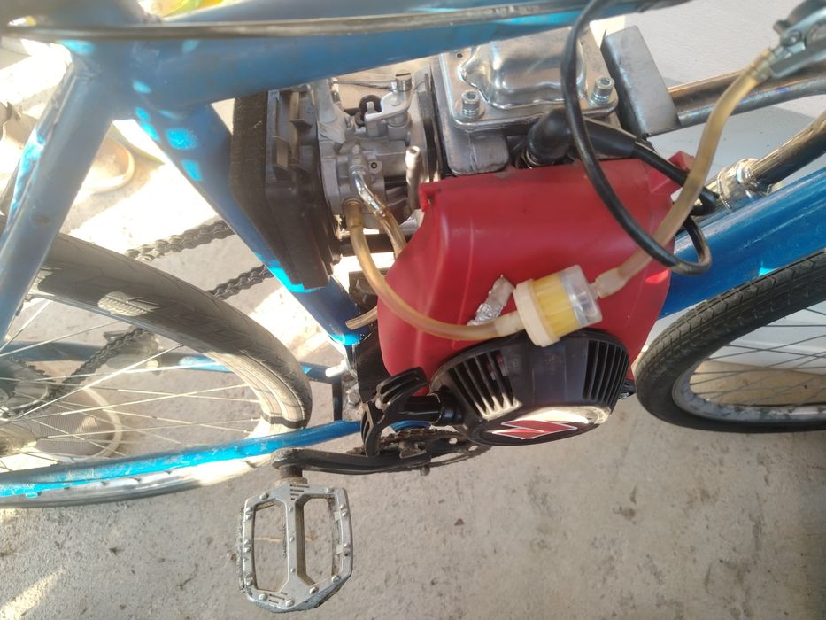 Bicicleta cu motor în 4timpi
