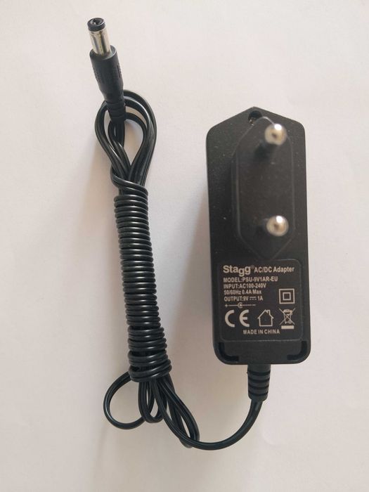 Адаптер.Оригинален,нов.Model: PSU-9V 1A-EU