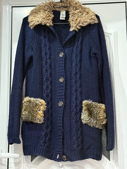 Топла жилетка there