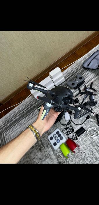 Dronă DJI FPV fly more