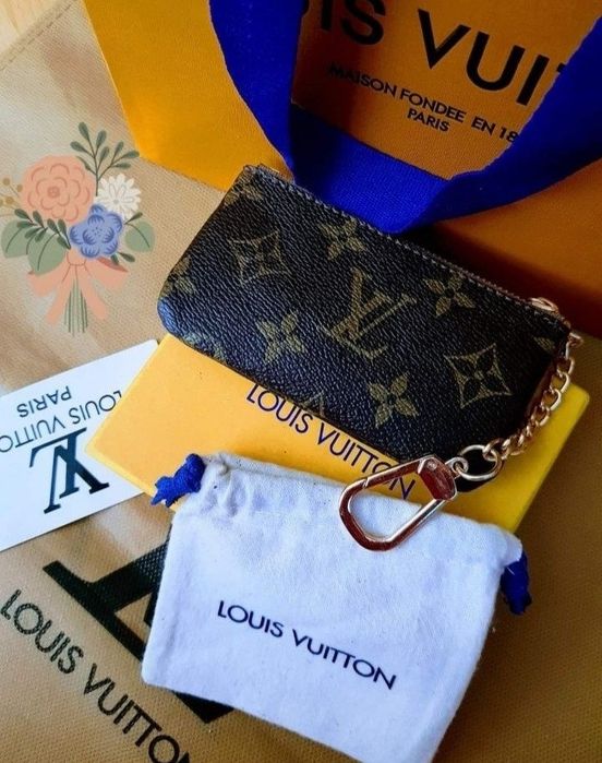 Portchei Louis Vuitton, model unisex,cutie inclusa