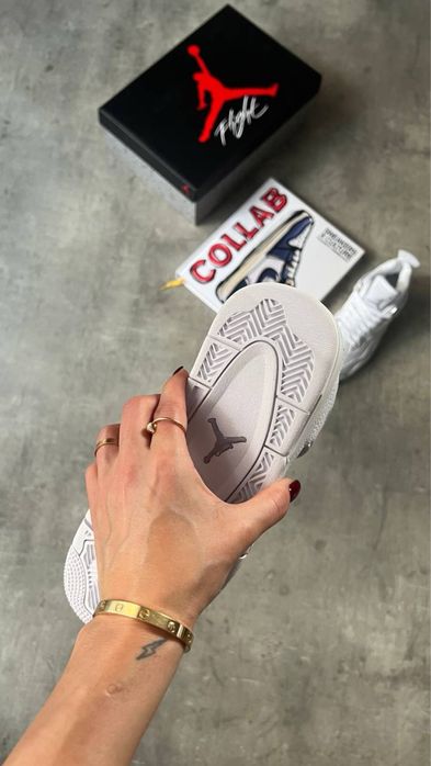 Air Jordan 4 Retro “Metallic White Silver”