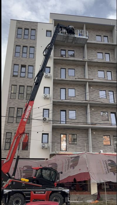 Închiriez incarcator telescopic rotativ Manitou