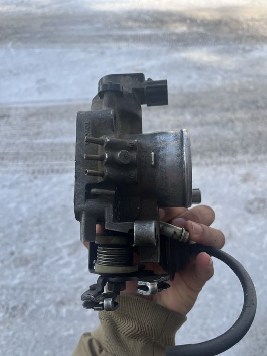 Дросленный заслонка