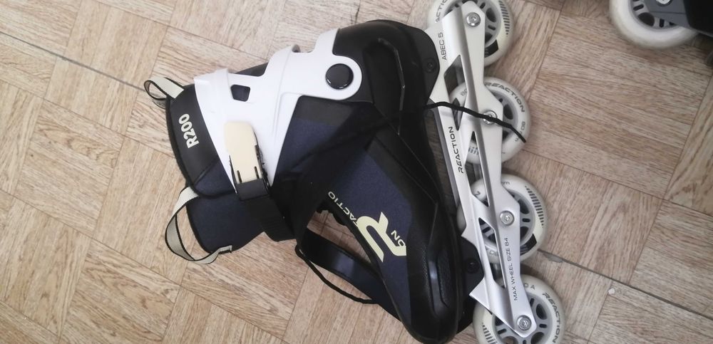 Роликовые коньки