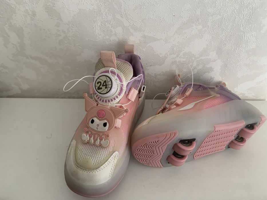 Роликовые кроссовки б/ у