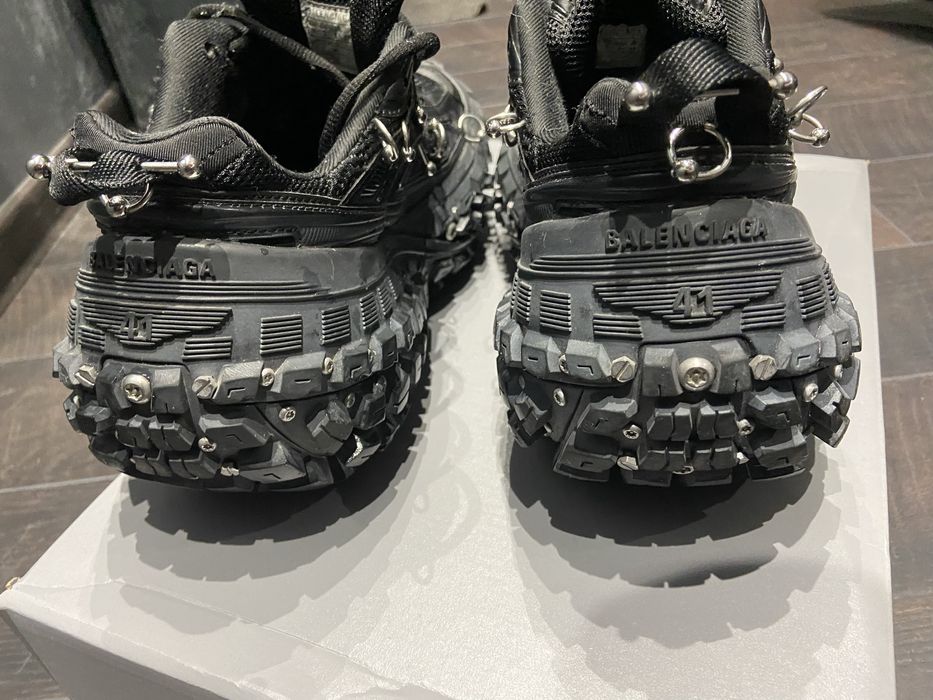 Balenciaga defender piercings