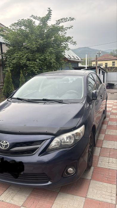 Машина Тойота королла