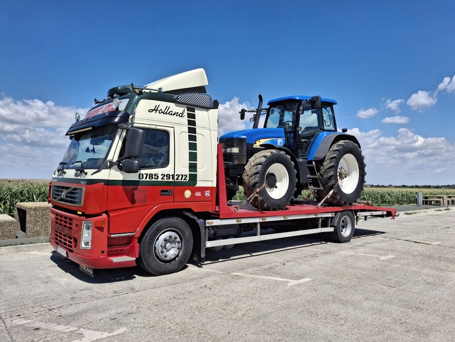 Tractari auto Alexandria si judetul Teleorman Transport Utilaje Tractor Combina Remorca Buldoexcavator Combinator Disc Met Plug