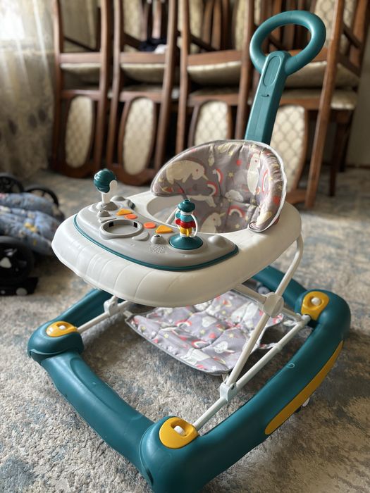 Продам коляску и ходунок