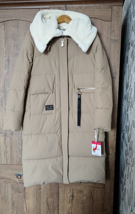 Новый пуховик 48 размера