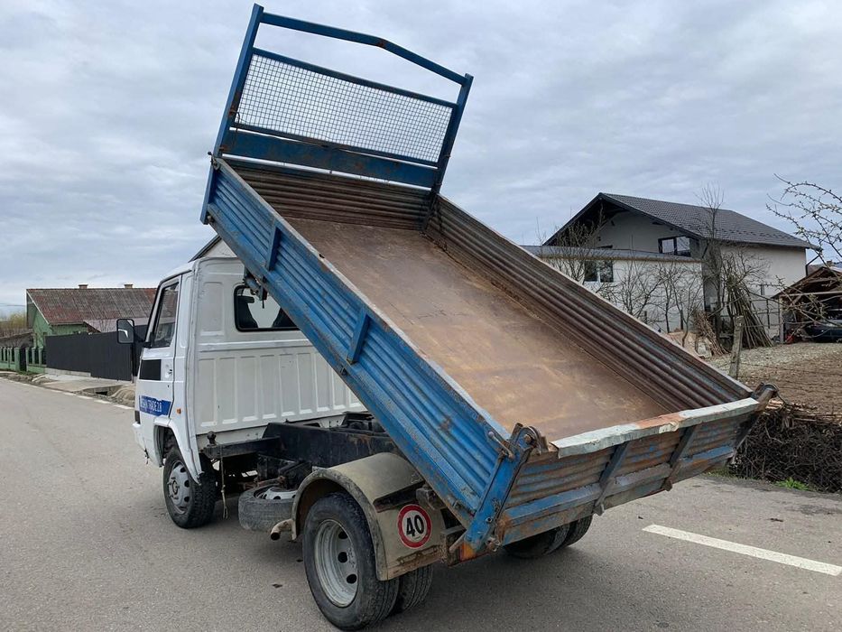 Nissan trade basculanta trilaterala