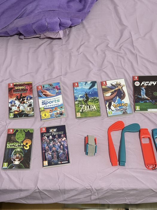 Nintendo Switch OLED + Jocuri & Accesorii – de Vânzare