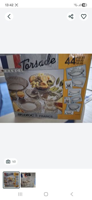 Pătură cu o  pernă de decor.