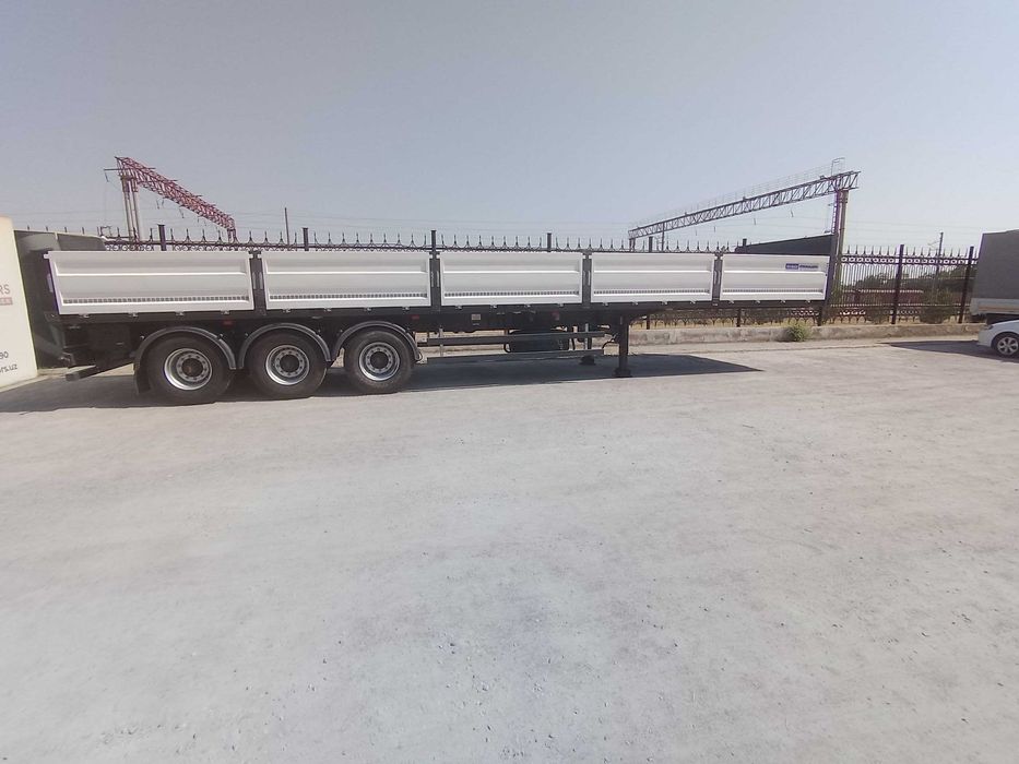 Полуприцеп бортовой контейнеровоз UzAutoTrailer