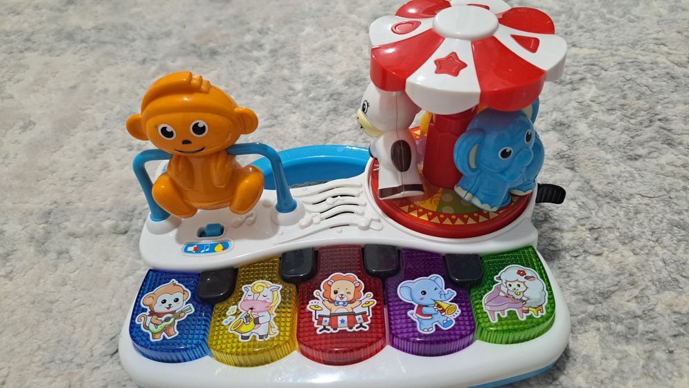 Pian carusel cu melodii si sunete de animale