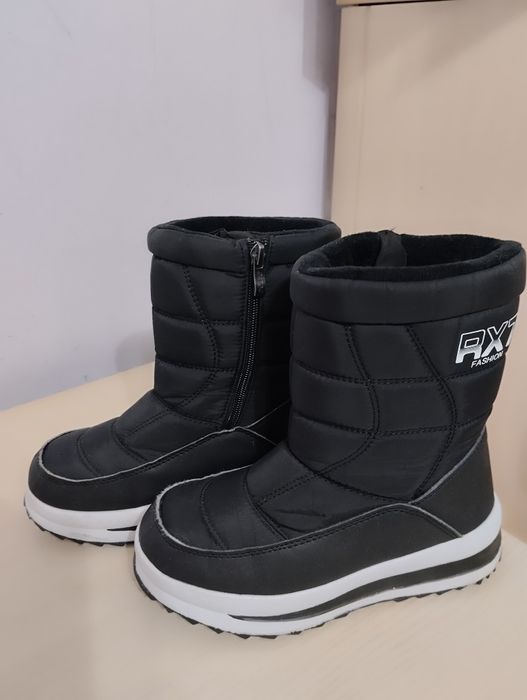 Дутыши очень тёплые,размер 35-36.Новые!!!