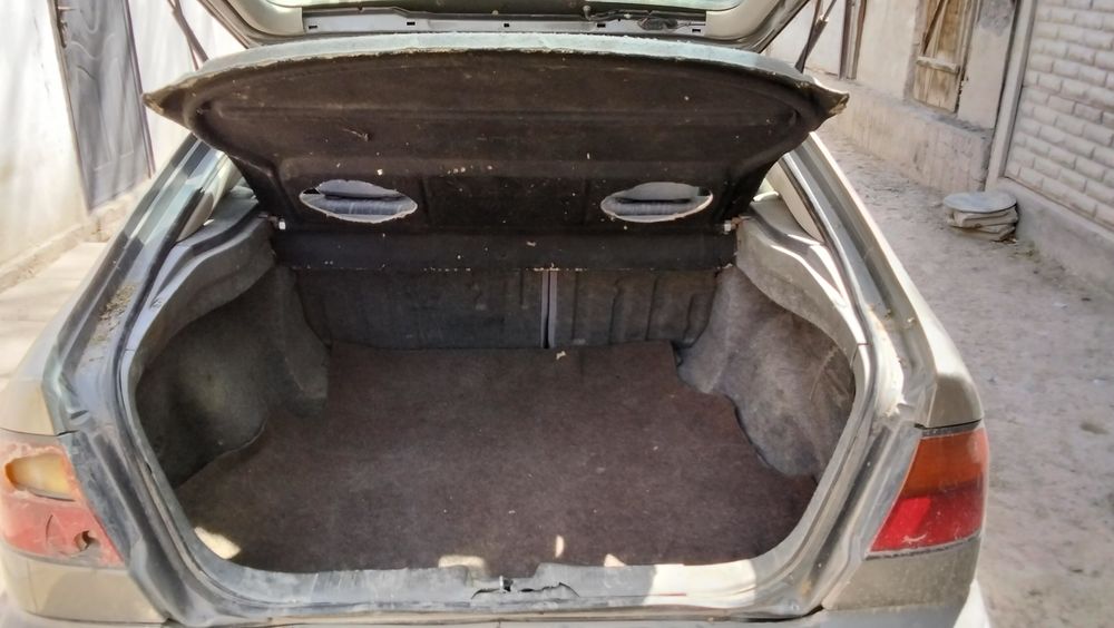 Ниссан Примера P11