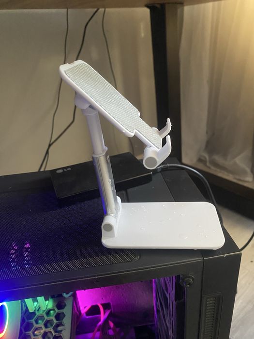 Подставка для телефона джостика.