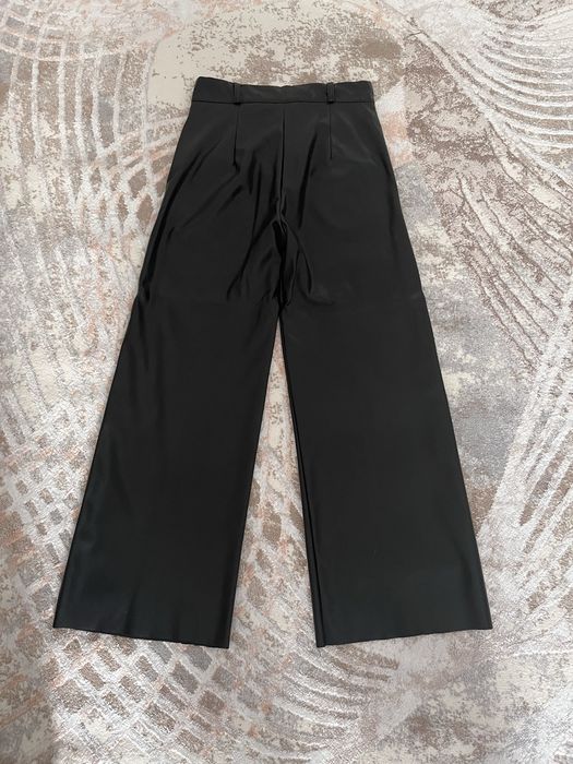 Кожанные брюки широкие