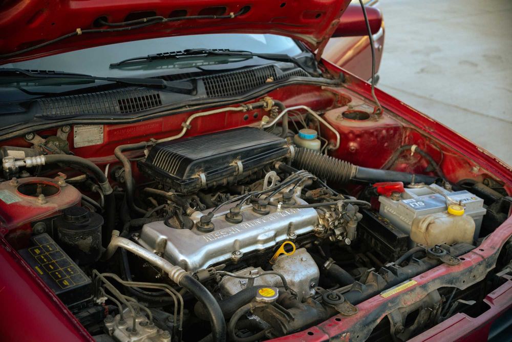 Nissan Primera Invitation P10 Hatchback 1995 1.6 DOHC