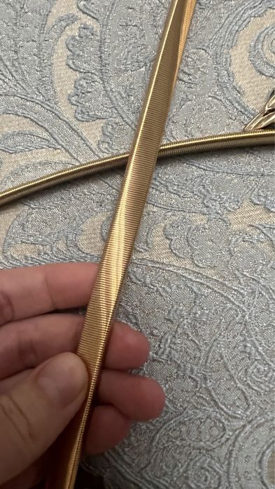 Ремень. Пояс золотого цвета.