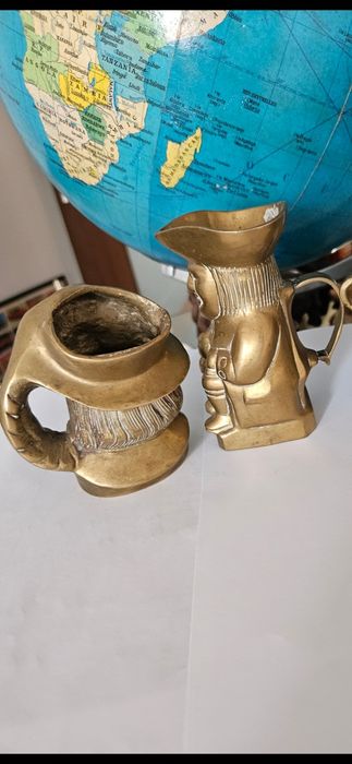 Halbe bronz cu fete de om