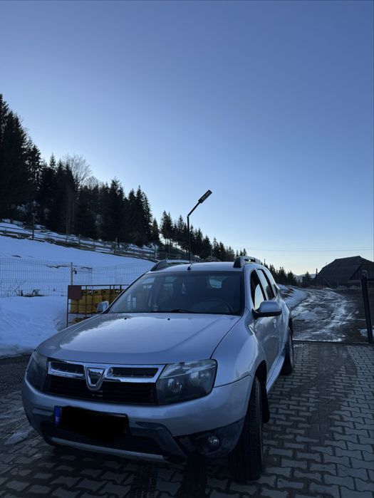 Dacia Duster 1.6 benzină,105 cp,4x4 la buton