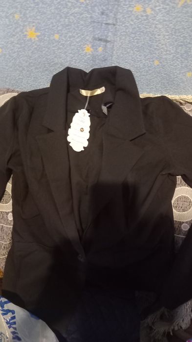 Продам  женскиий пиджак .Новый