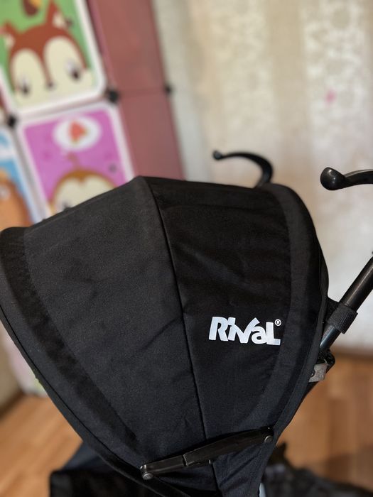 Продам прогулочную коляску Rival.