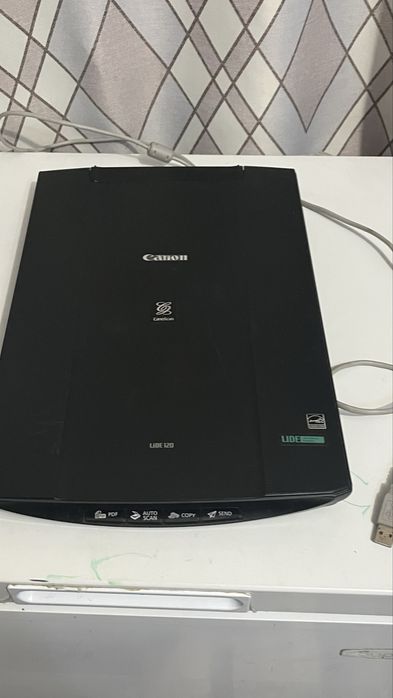 Обычный сканер Canon формата А4.