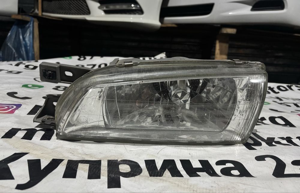 Фара галоген Subaru Impreza левая сторона