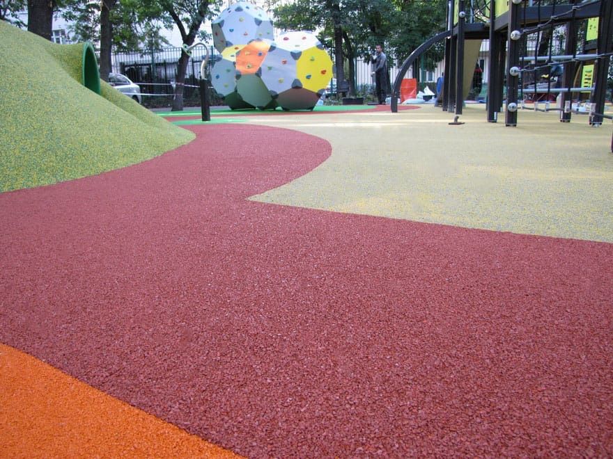 Укалдка тартанового покрытия (крошка/резина)