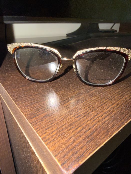 Диоптрични рамки за очила Prada и Etro