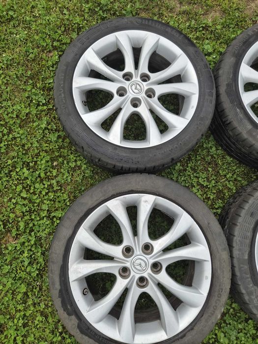Set 4 jante originale Mazda R17 + anvelope Continental