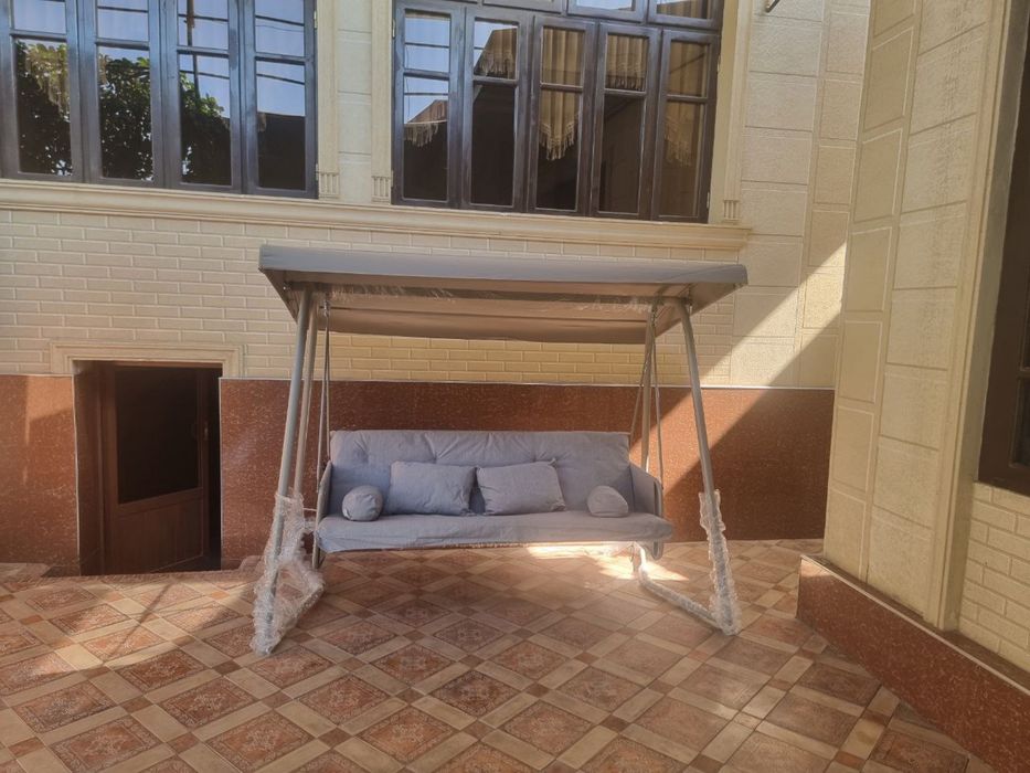 Садовая качеля китае