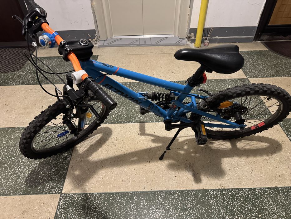 Vând bicicletă copii B’TWIN Rockrider 20” cu dublă suspensie