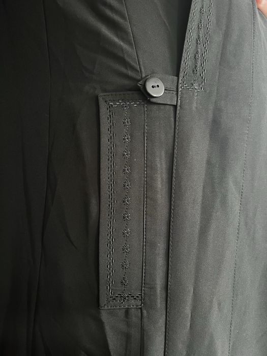 Dulamă și vestă călugărească