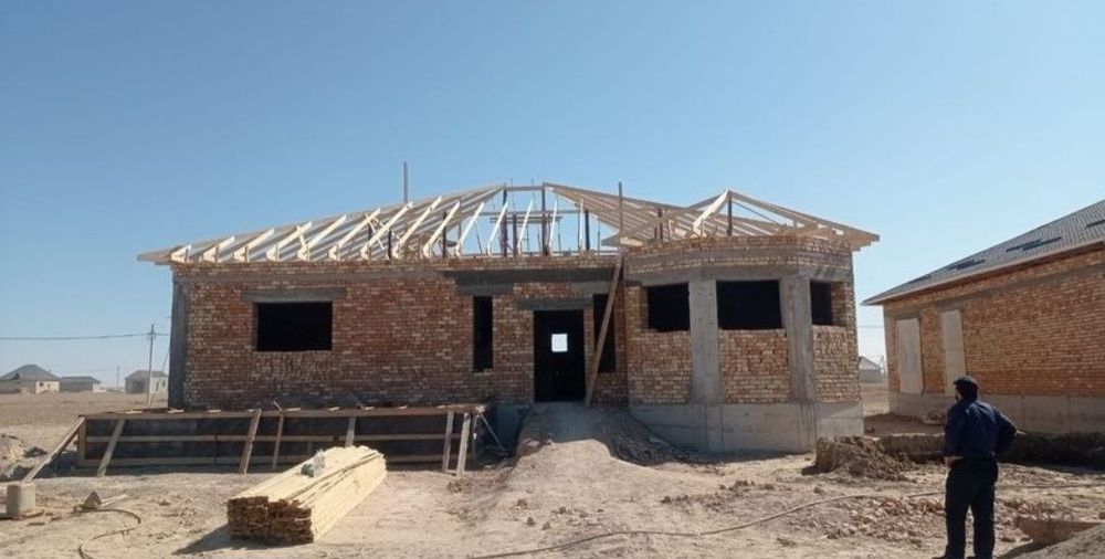 Строительная бригада строителей