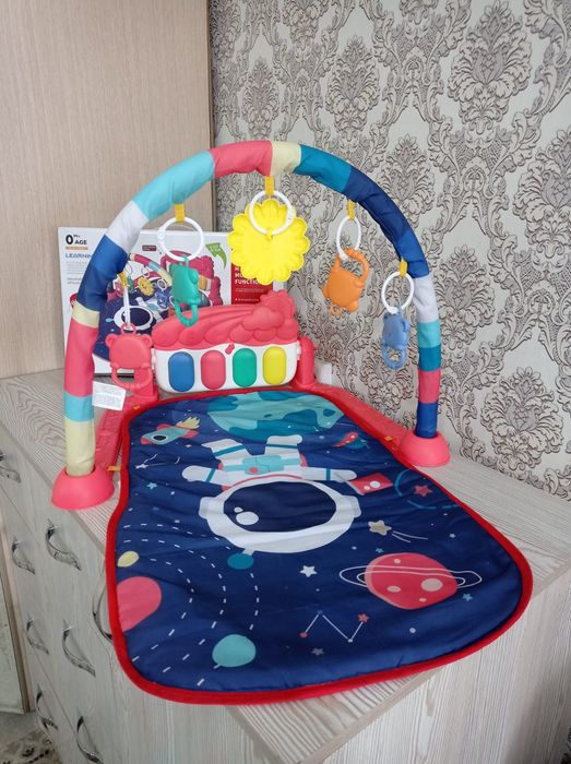 Музыкальный коврик и развивающая дуга