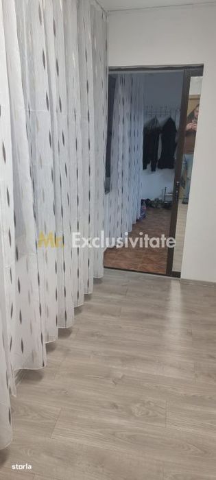 Casă P+M cu 1.558 mp teren, livadă și garaj