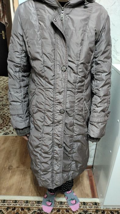 Продам теплый пуховик.