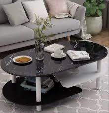 журнальный столик двухуровневую конструкцию овальной формы.