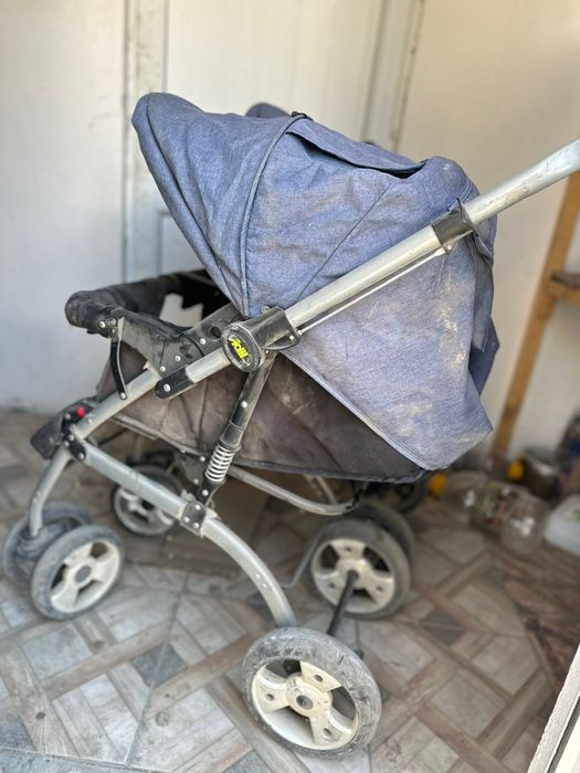 Детская каляска для двоини
