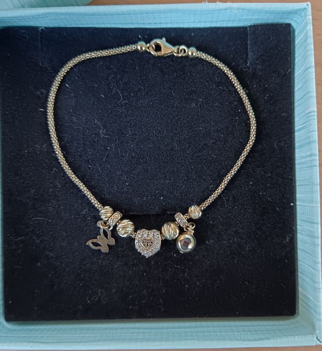 Продавам златна гривна пандора 14карата