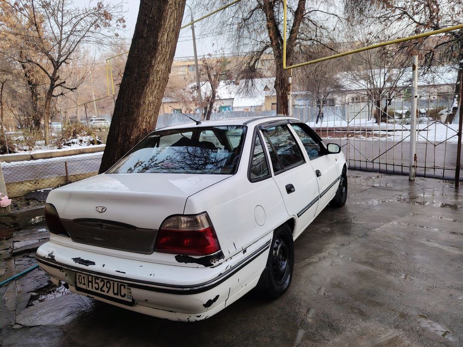 Daewo NEXIA Сонс