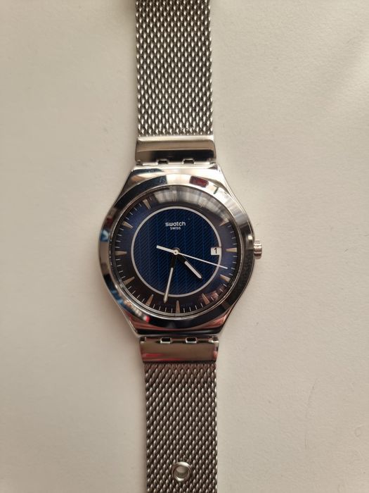 Часовник Swatch blue icone