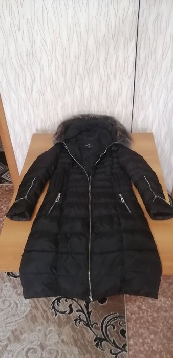 Продам женский пуховик
